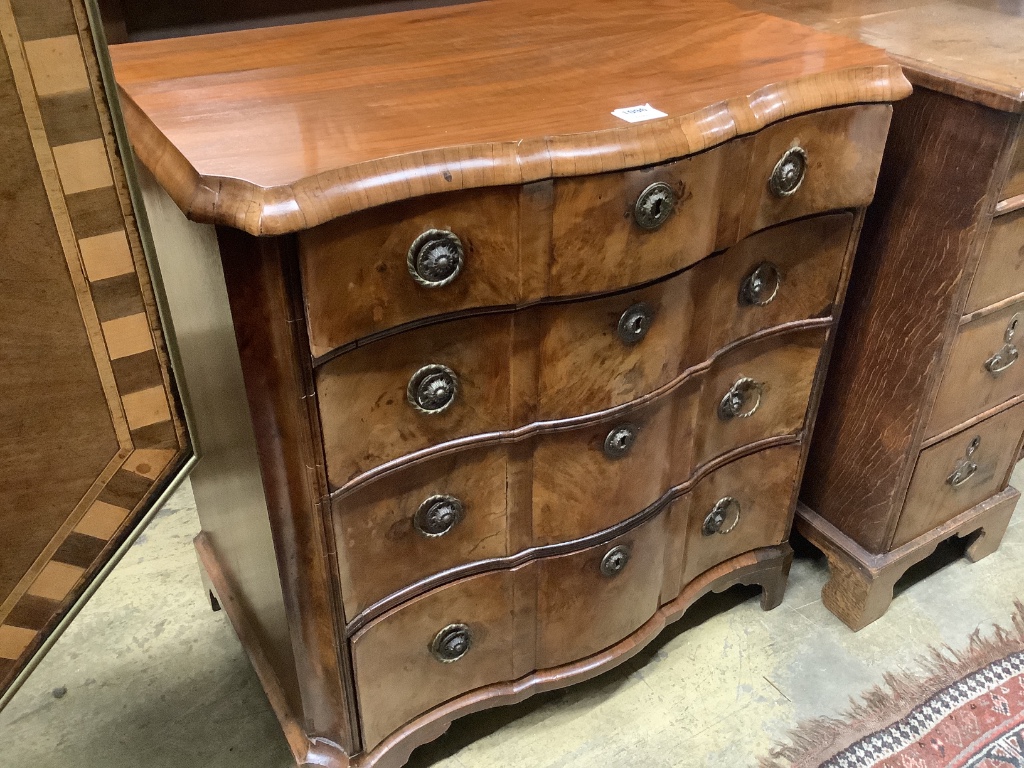 An 18th century Dutch walnut block fronted chest of four graduated drawers, width 78cm, depth 50cm, height 80cm